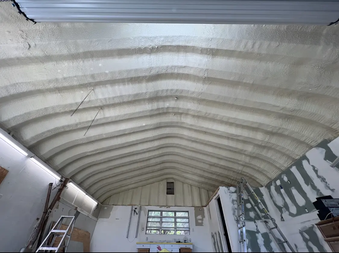 Spray polyurethane foam applied to the underside of a metal roof deck in Lochearn